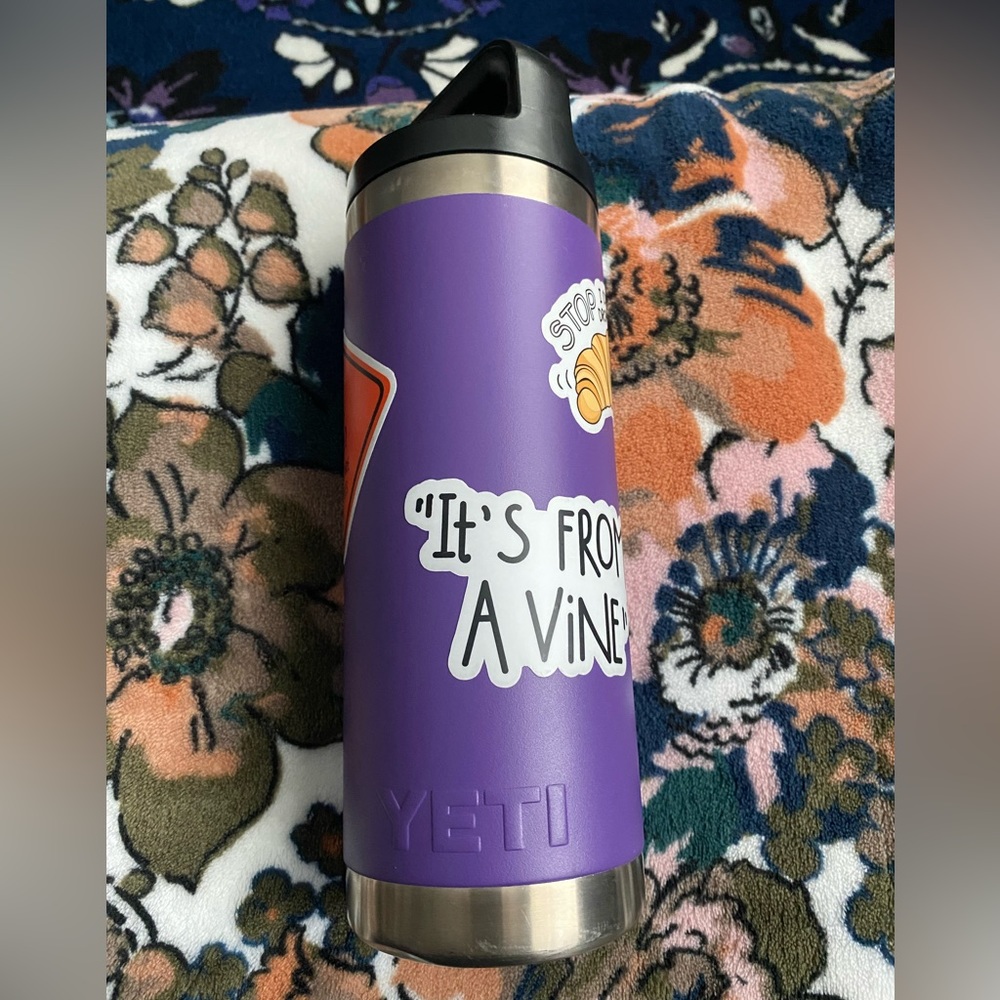 Yeti. Purple. Used a few times. Vine stickers.
